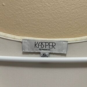 Sleeveless cream color shirt